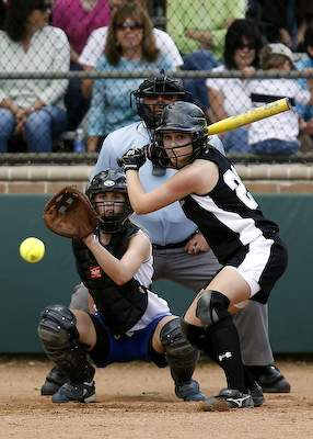 Softball player is at bat